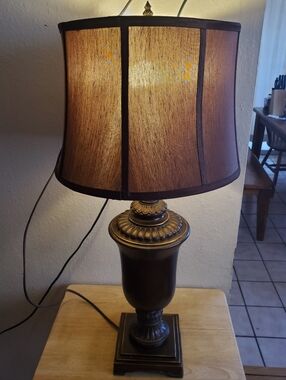 Crestview Classic Brown/Bronze Urn Style Table Lamp with Fabric Shade
